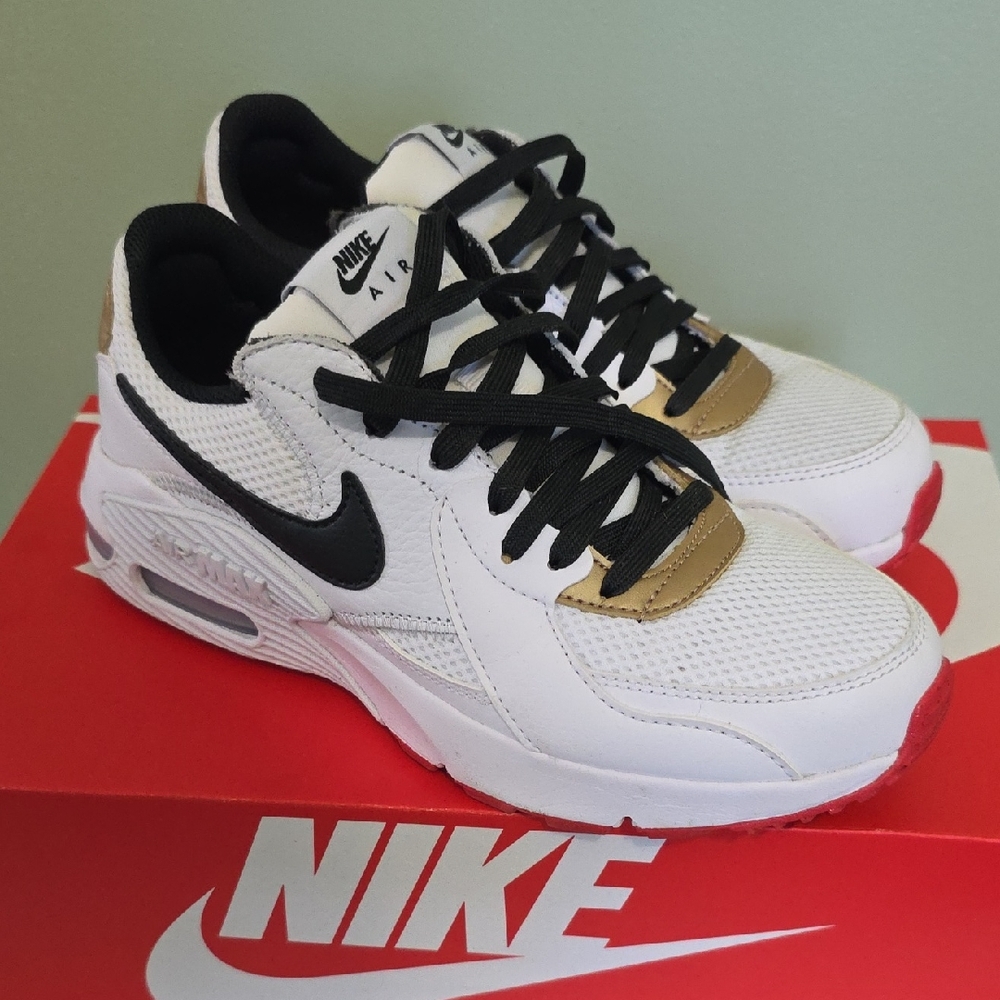 Nike Air White and Black Sneakers with Gold Accents